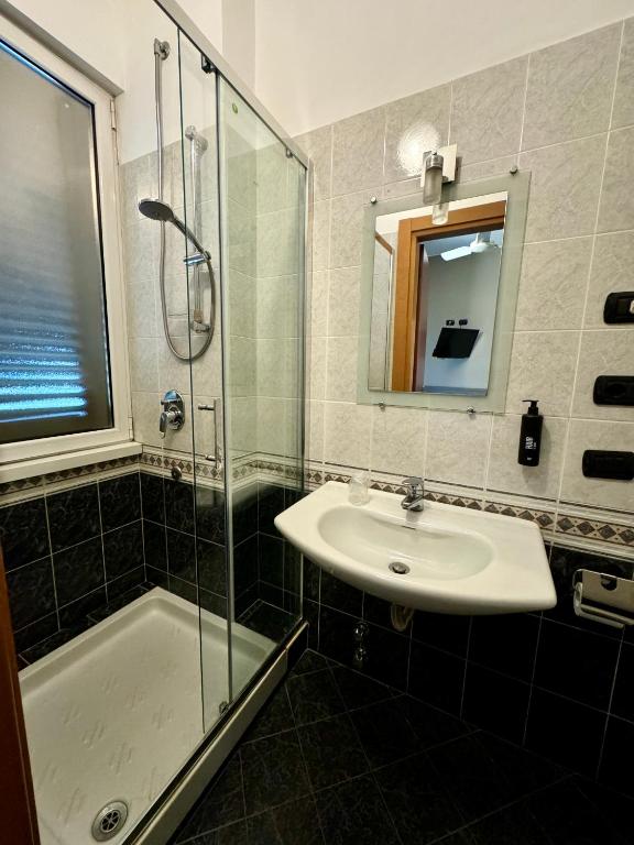 Koupelna v ubytování Hotel Parma