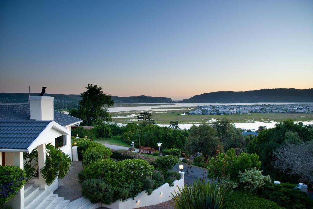 an aerial view of a house with a view of a river at Candlewood Lodge in Knysna