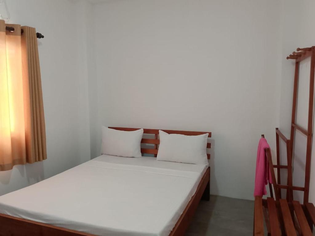 Postel nebo postele na pokoji v ubytování Seven Lotus Villa Kandy