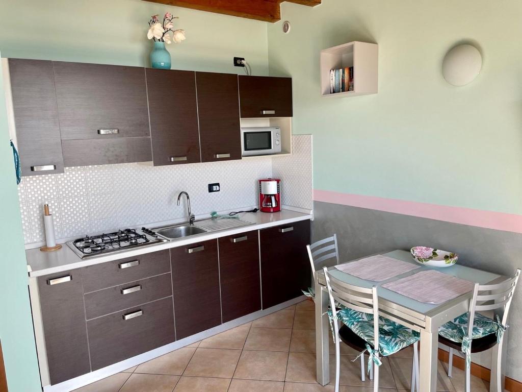 Kuchyň nebo kuchyňský kout v ubytování Appartamento Flair - Theater Home
