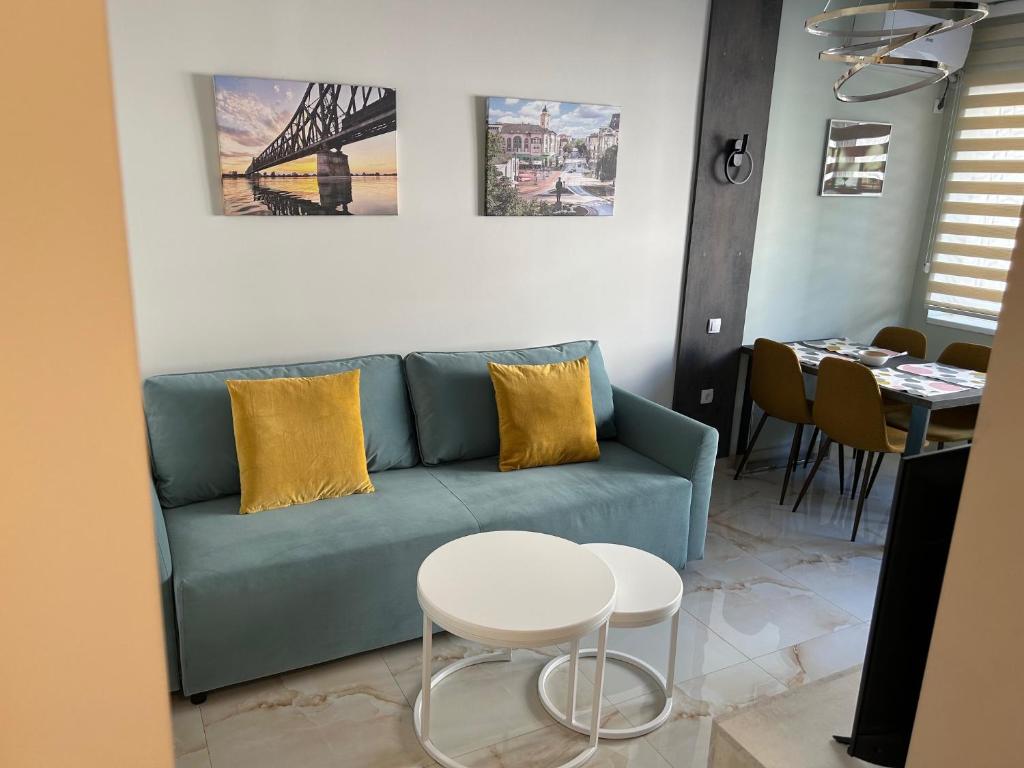 Posezení v ubytování Hello One Apartman