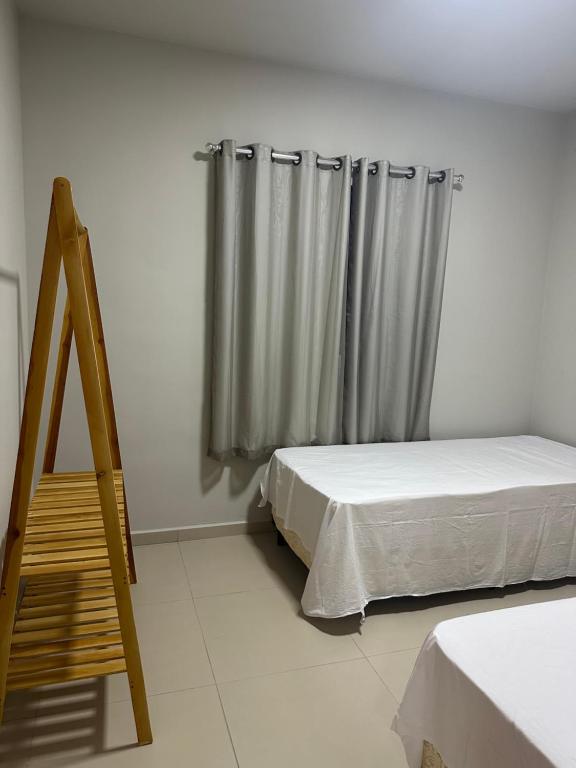 Postel nebo postele na pokoji v ubytování Solaris Praia