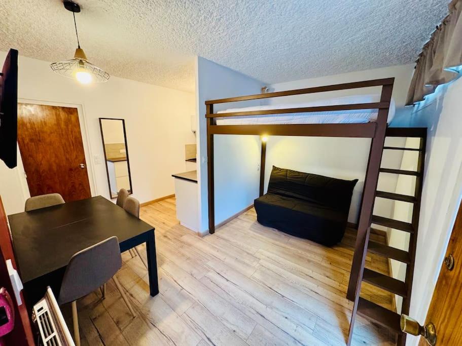 Ένα ή περισσότερα κρεβάτια σε δωμάτιο στο Studio Cosy