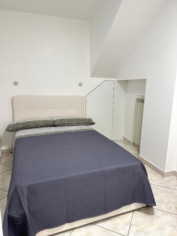 Postel nebo postele na pokoji v ubytování Lazzaro