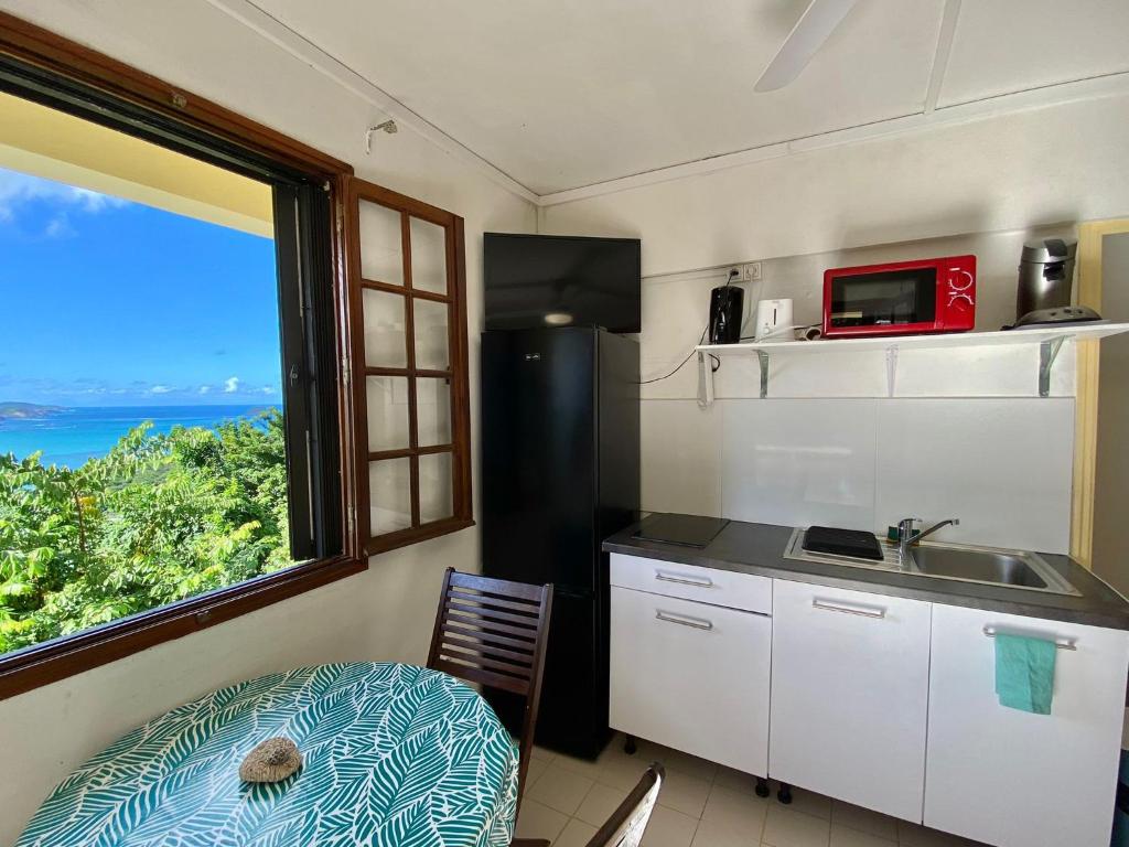 Kuchyň nebo kuchyňský kout v ubytování Top Hill Appartements