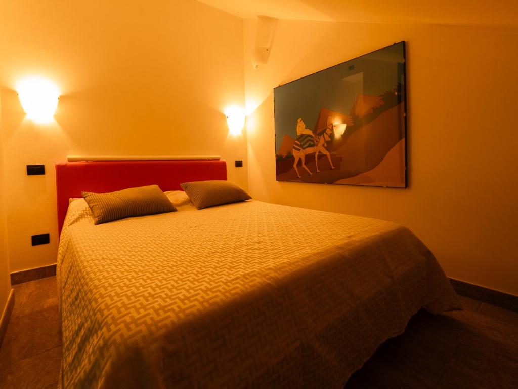 Postel nebo postele na pokoji v ubytování Dada House by Holiday World