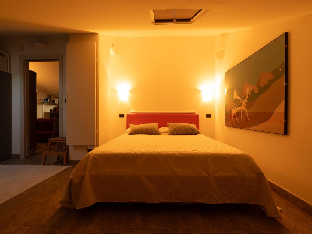 Postel nebo postele na pokoji v ubytování Dada House by Holiday World