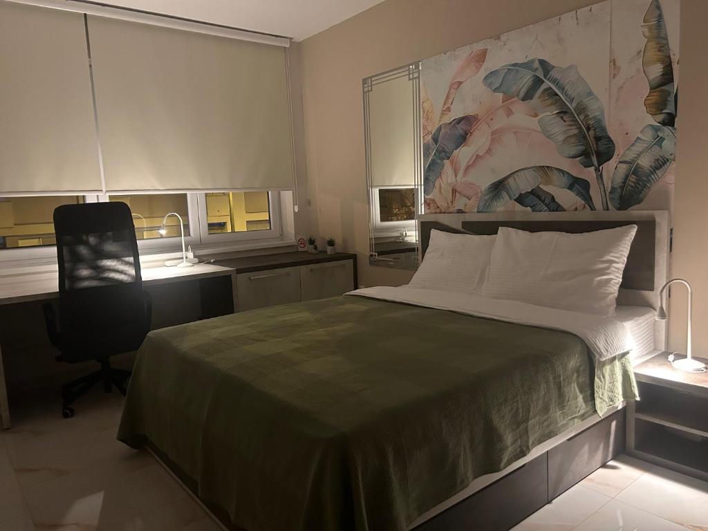 Postel nebo postele na pokoji v ubytování Hello One Apartman