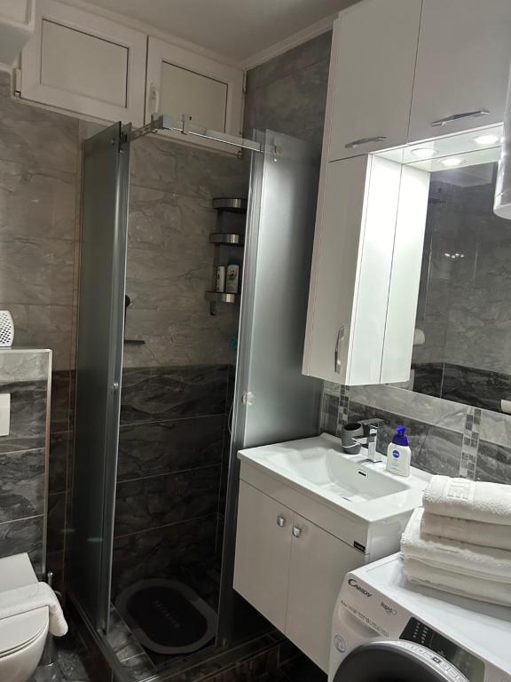 Koupelna v ubytování Hello One Apartman