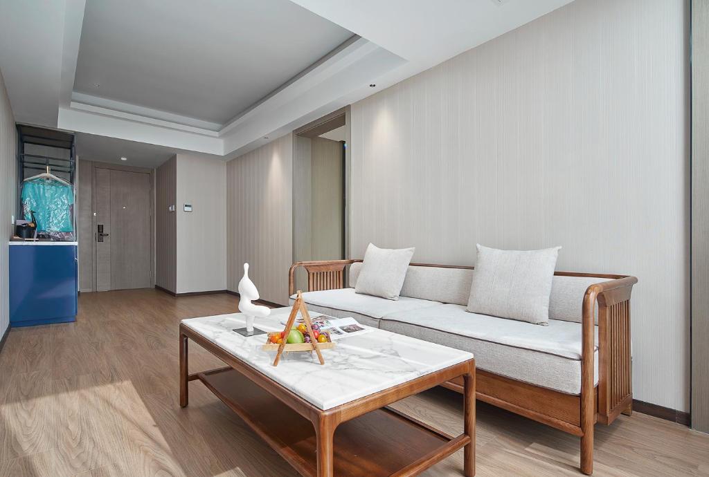 Posezení v ubytování Mehood Lestie International Hotel Linhexi Guangzhou East Railway Station Branch - Free Shuttle Bus to Canton Fair Complex During Canton Fair Period & Free afternoon tea & Free midnight snack & Free VPN Internet Access