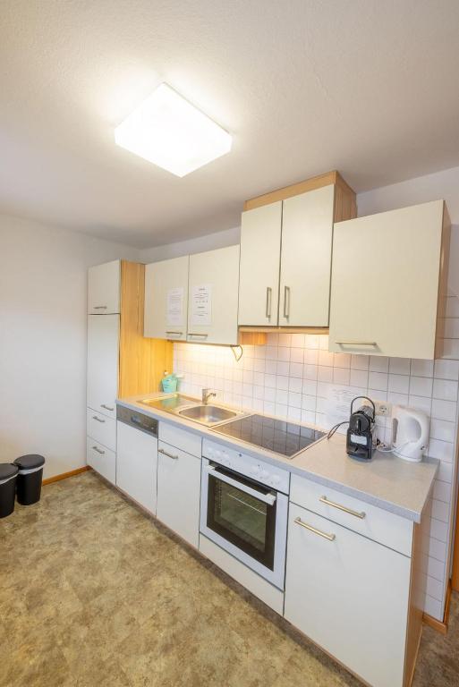 Kuchyň nebo kuchyňský kout v ubytování Gästehaus Leypold