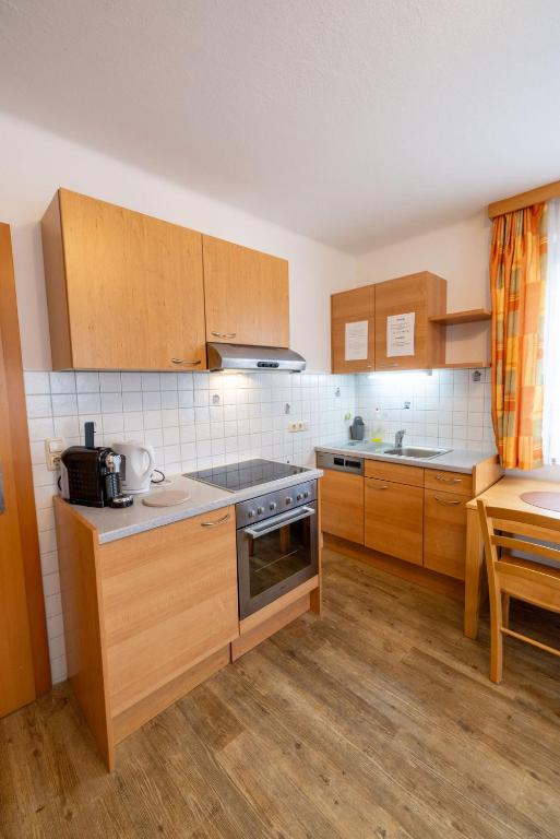 Kuchyň nebo kuchyňský kout v ubytování Gästehaus Leypold