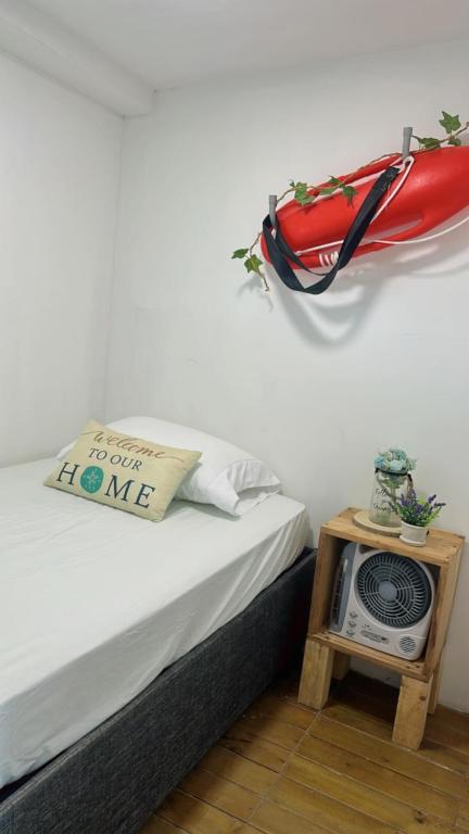 Postel nebo postele na pokoji v ubytování Itaca Eco House