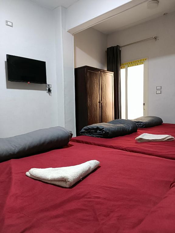 Postel nebo postele na pokoji v ubytování Eljoker pyramids hostel