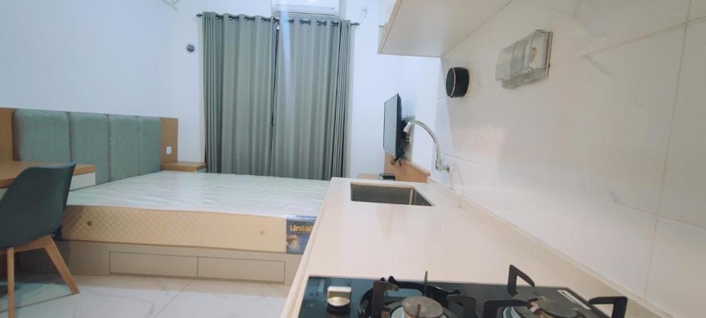 Postel nebo postele na pokoji v ubytování Skyhouse BSD 2 Bedroom & Studio Apartments - Perfect for ICE BSD Events