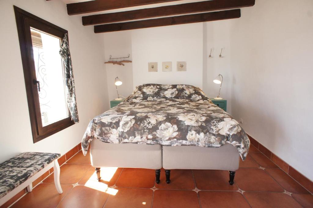 Postel nebo postele na pokoji v ubytování Casa con Balcon