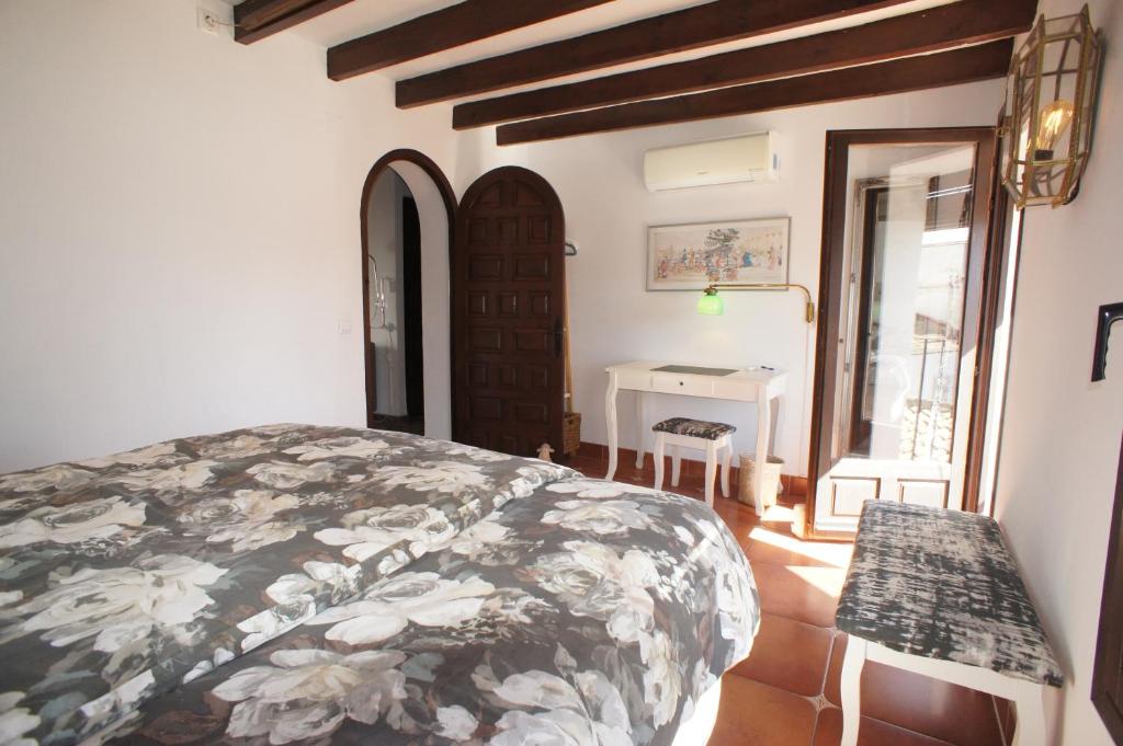 Postel nebo postele na pokoji v ubytování Casa con Balcon