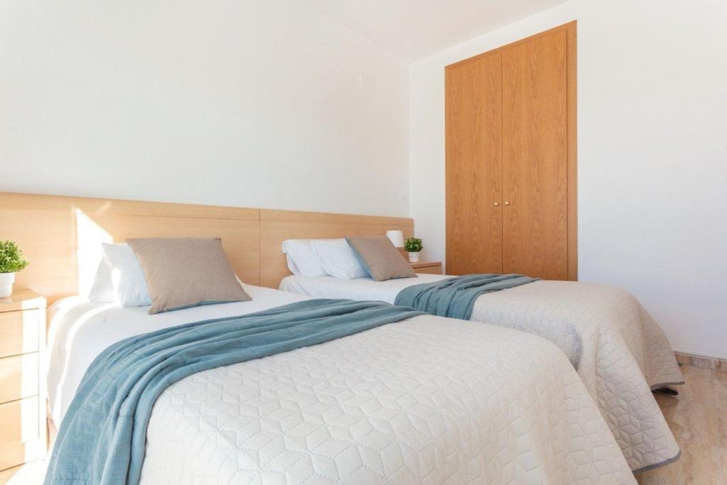 Posteľ alebo postele v izbe v ubytovaní Casa Bosque del Mar
