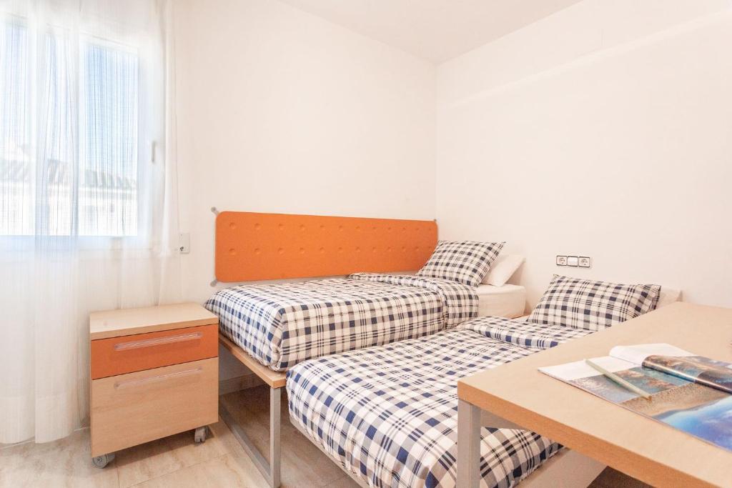 Postel nebo postele na pokoji v ubytování Casa Sunset