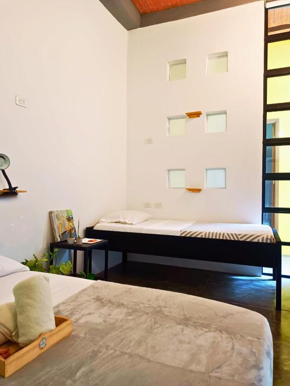 Postel nebo postele na pokoji v ubytování Imagine hostel