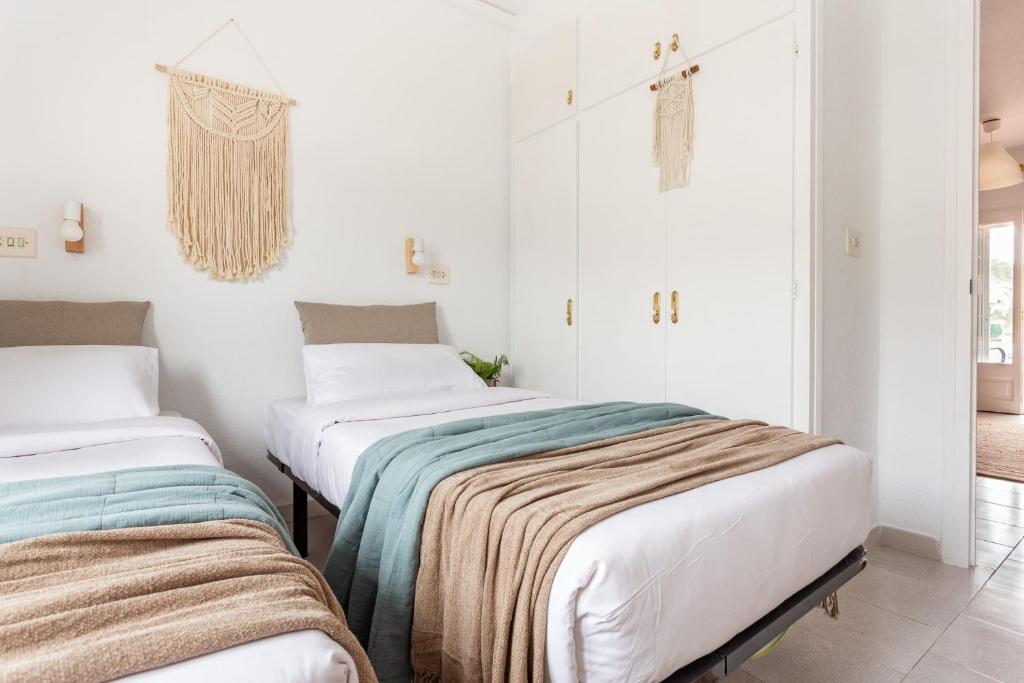 Posteľ alebo postele v izbe v ubytovaní Apartamento Bohemia