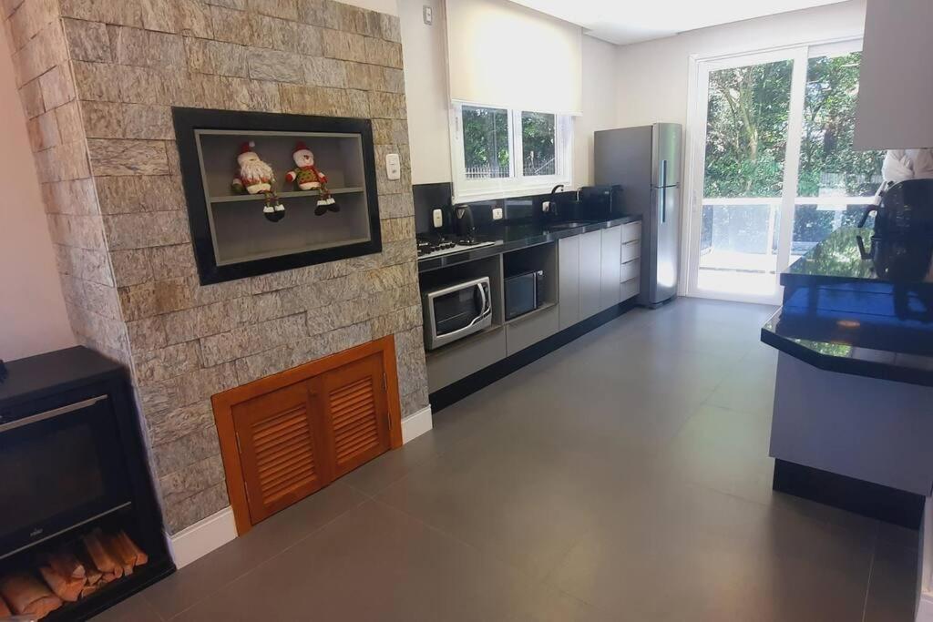 Kuchyň nebo kuchyňský kout v ubytování Casa das Palmeiras 2