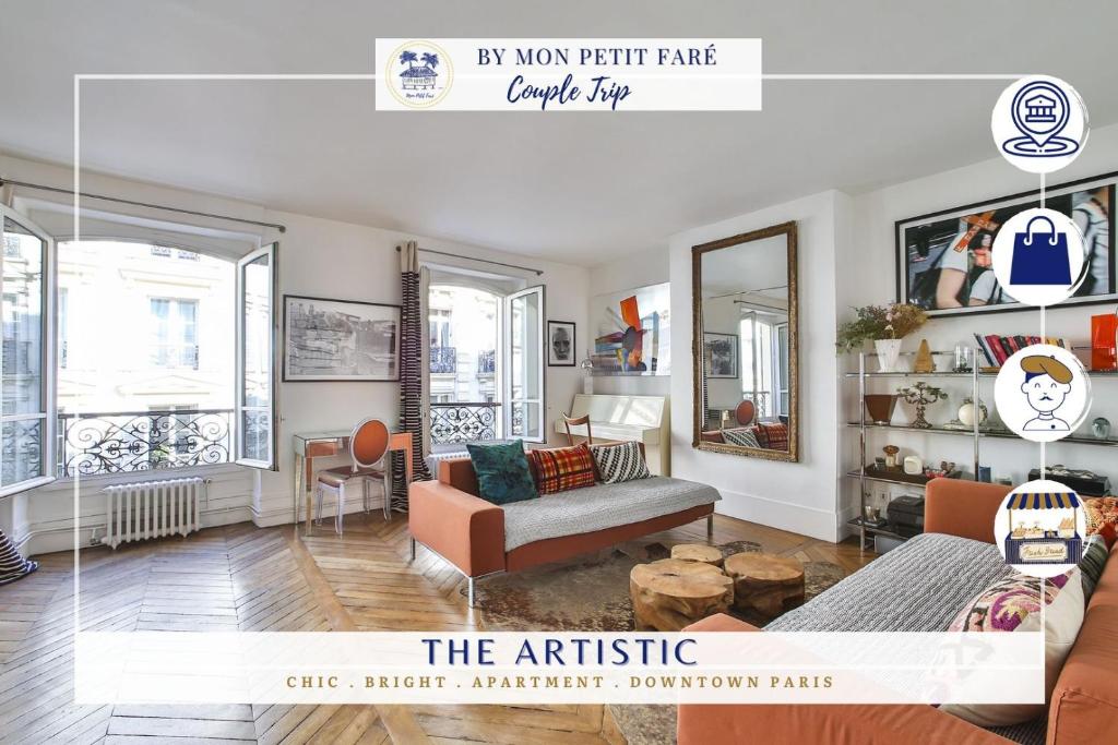 un salon avec un canapé et une table dans l'établissement L'artistique - design & spacieux - Tour Eiffel, à Paris