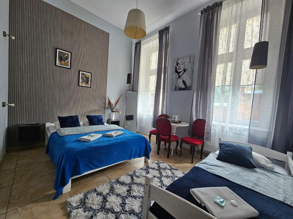 Postel nebo postele na pokoji v ubytování Deja Vu Hostel