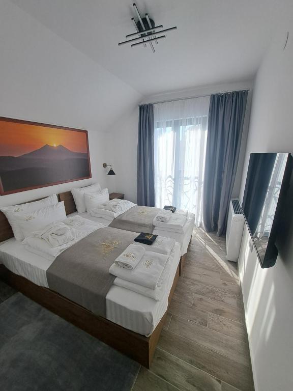 Postel nebo postele na pokoji v ubytování Soko IN Spa