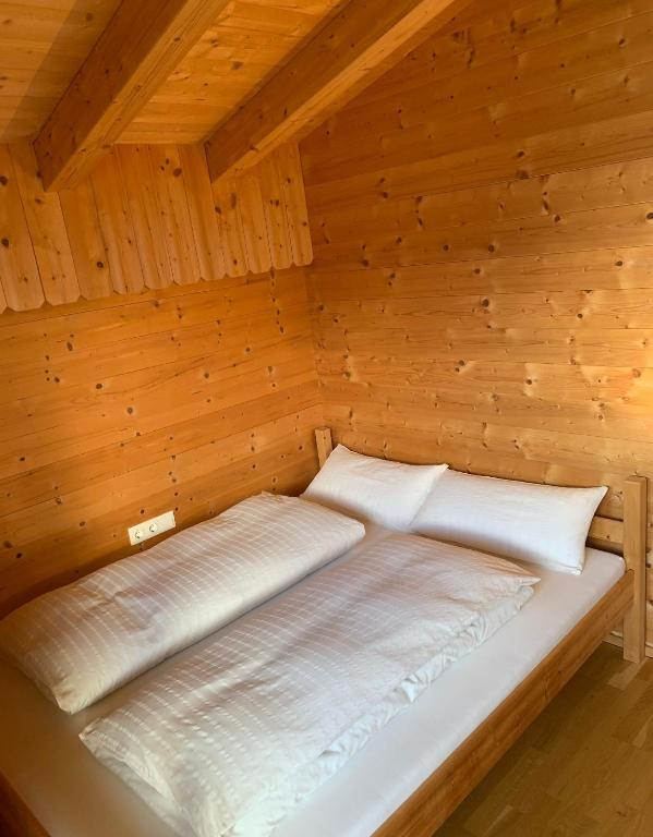 Postel nebo postele na pokoji v ubytování As Leitl