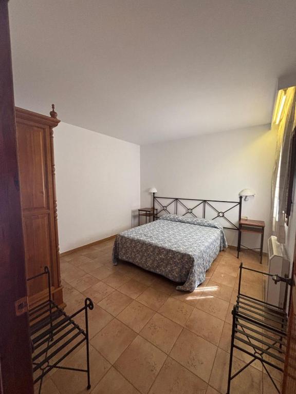 Postel nebo postele na pokoji v ubytování El Domingo en el Valle