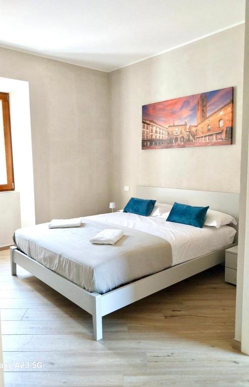 Postel nebo postele na pokoji v ubytování La Corte di Scanzo - Luxury and Charm