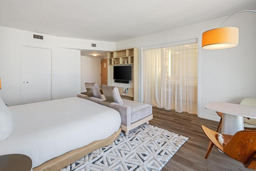 Ein Bett oder Betten in einem Zimmer der Unterkunft The Grayson Hotel Miami Downtown