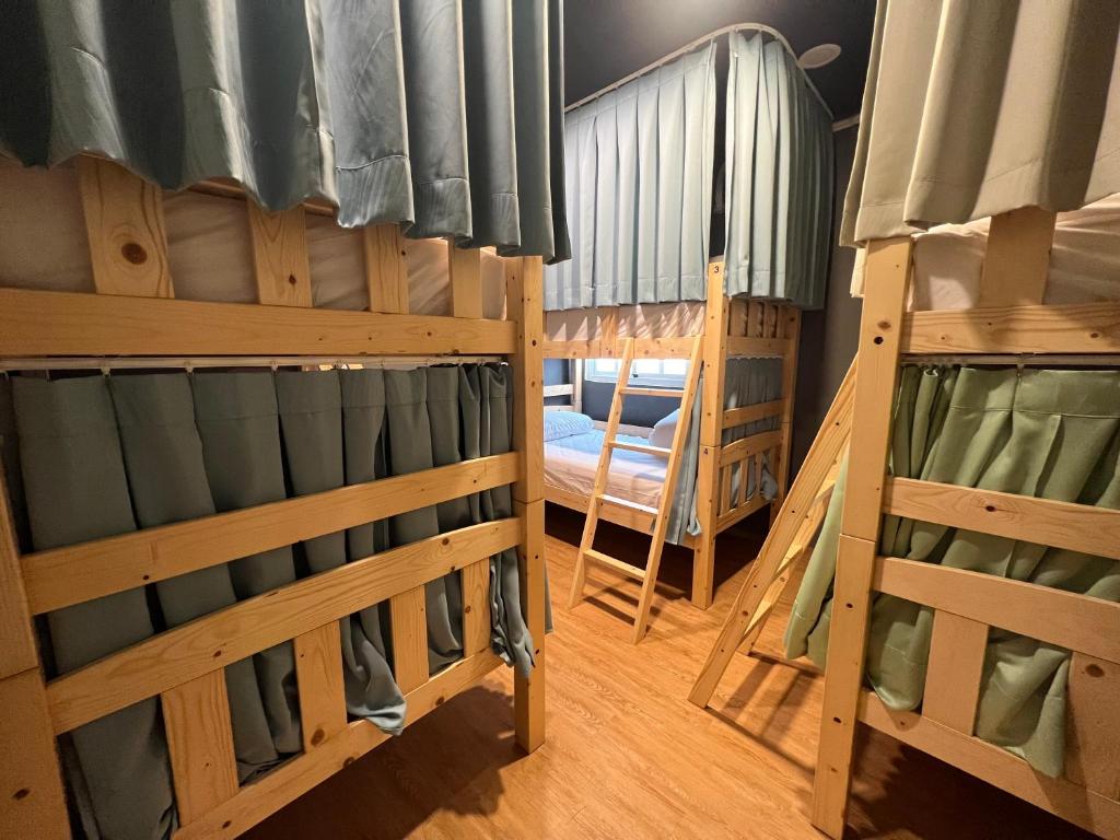 Postel nebo postele na pokoji v ubytování Mu-In Hotel