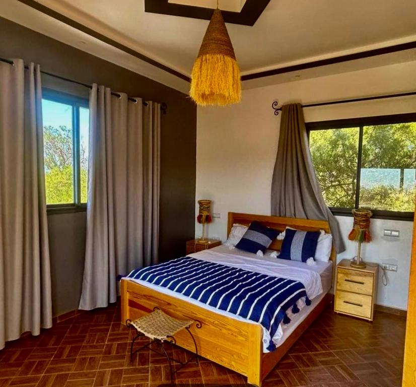 Postel nebo postele na pokoji v ubytování Villa azure