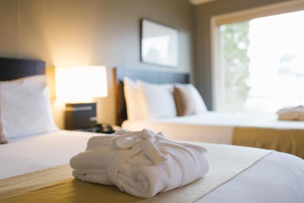 Postel nebo postele na pokoji v ubytování Earthbox Inn & Spa