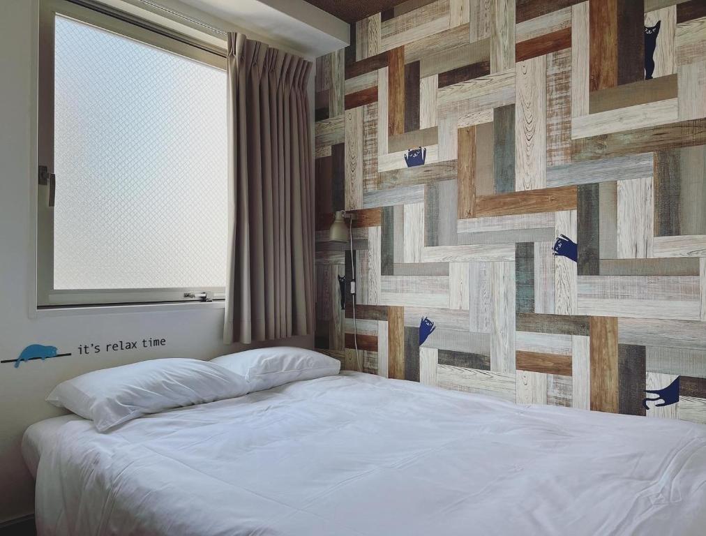 Postel nebo postele na pokoji v ubytování Hotel Wan Osaka ebisu - Vacation STAY 98711v