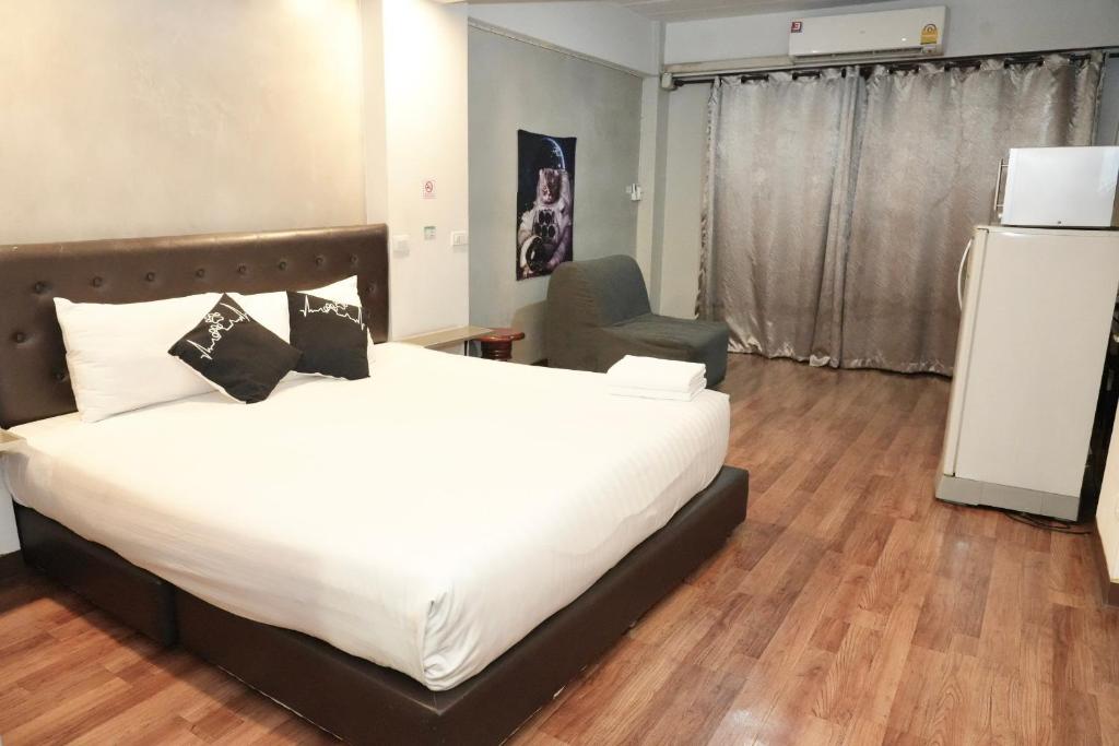 Postel nebo postele na pokoji v ubytování Bkk39 Airport hotel