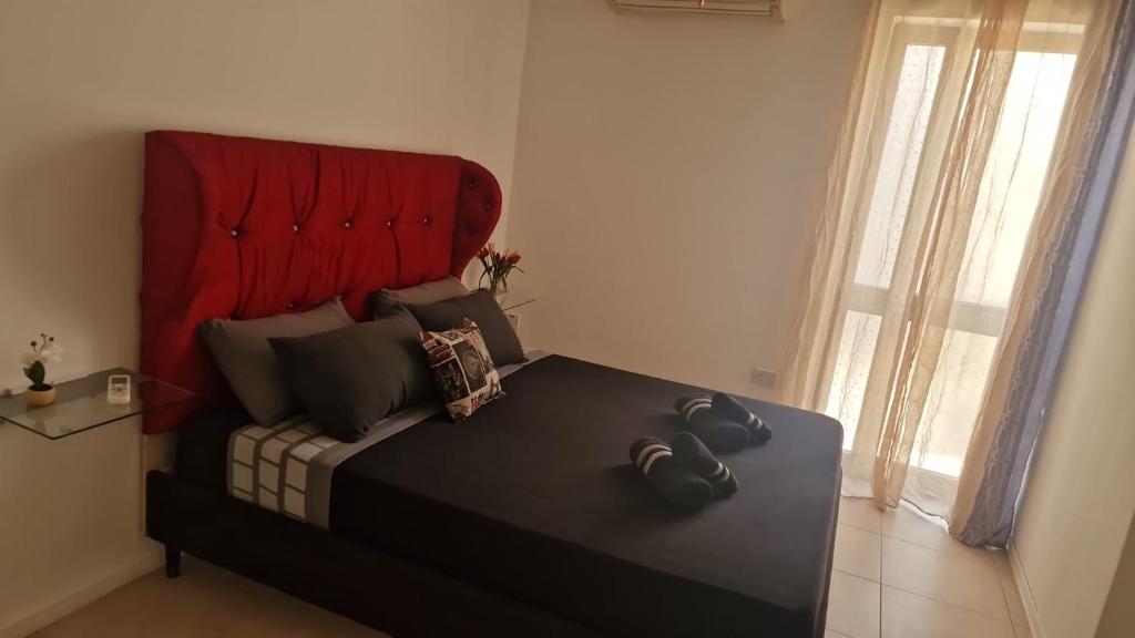 Letto o letti in una camera di PACEVILLE St Julians Apartments