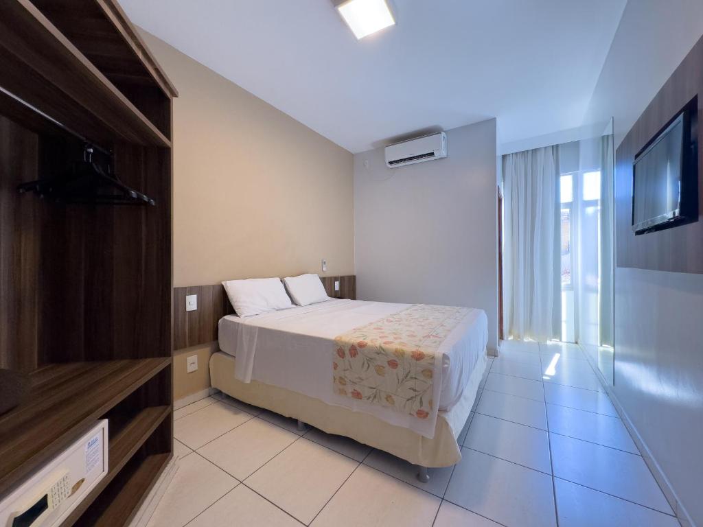 Postel nebo postele na pokoji v ubytování Hotel Morada das Águas