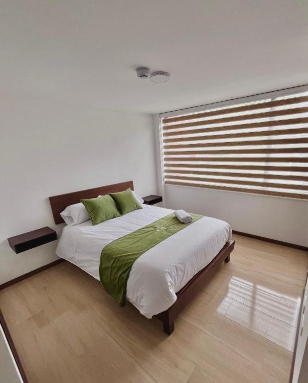 Postel nebo postele na pokoji v ubytování Hotel RYA Center