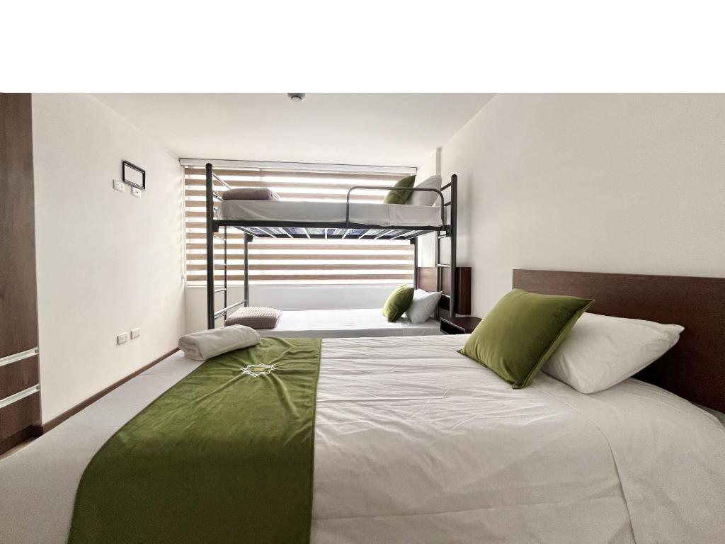 Postel nebo postele na pokoji v ubytování Hotel RYA Center