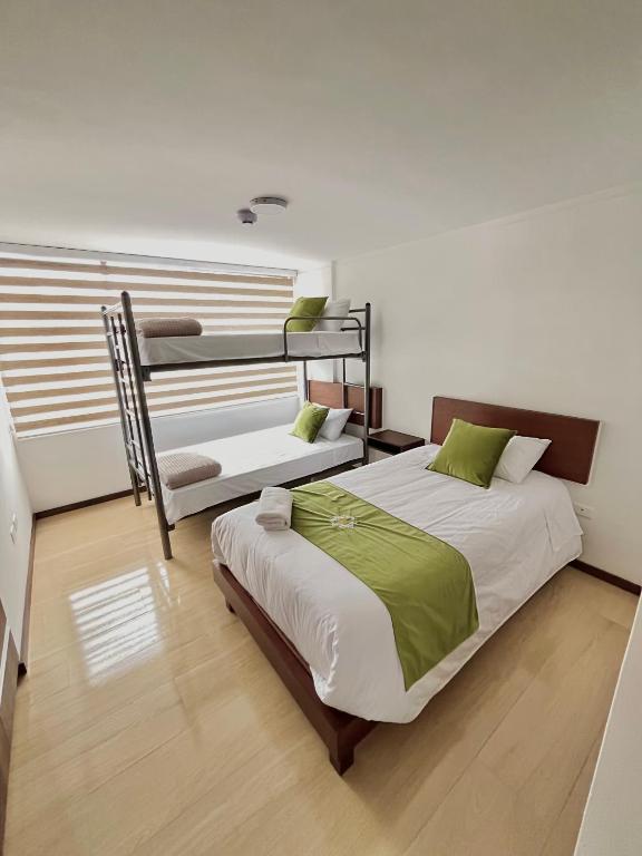 Postel nebo postele na pokoji v ubytování Hotel RYA Center