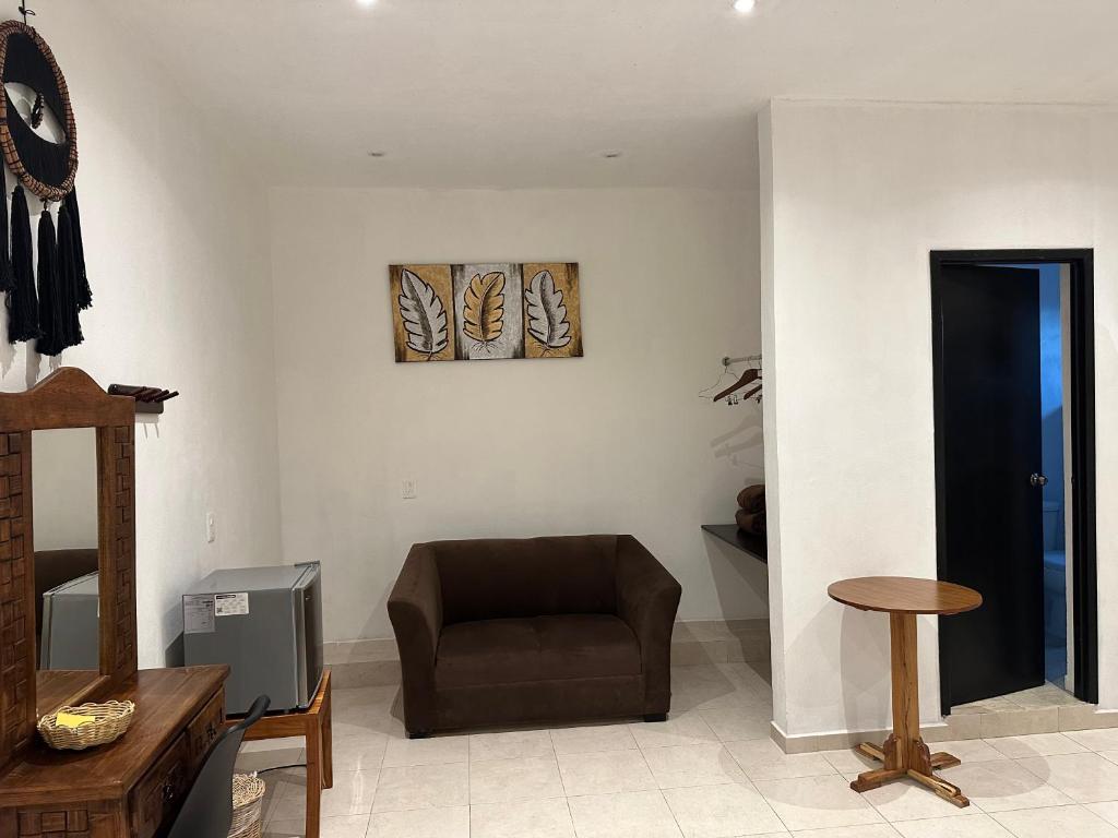 Posezení v ubytování Hotel Casa Henequén