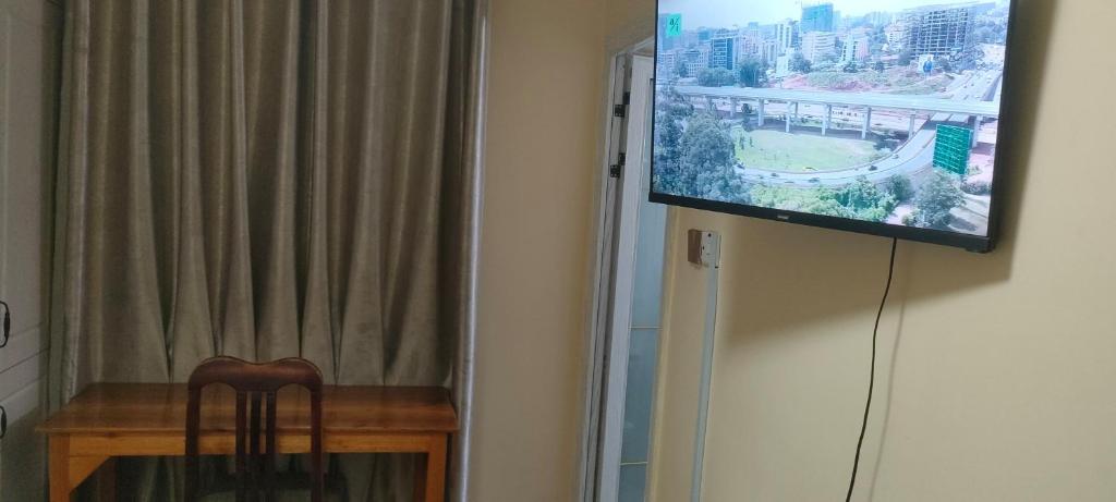 TV a/nebo společenská místnost v ubytování Sky Nest 14