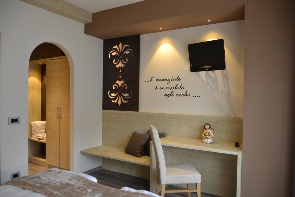 Postel nebo postele na pokoji v ubytování Hotel Azola