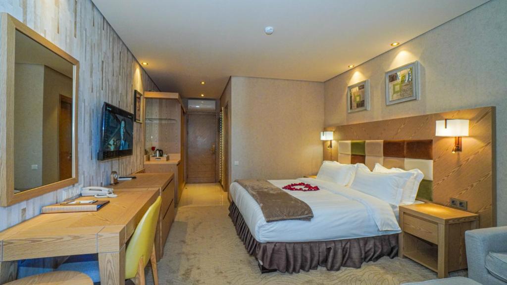 Postel nebo postele na pokoji v ubytování Dreamlend oasis chakvi Apartament