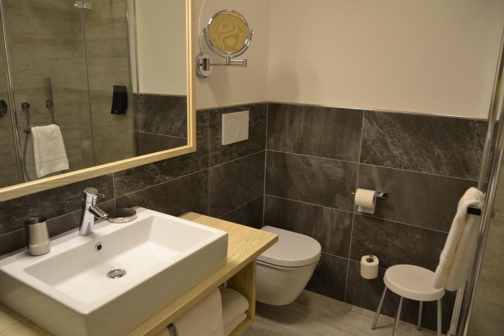 Koupelna v ubytování Hotel Azola