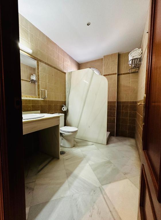 Koupelna v ubytování Hotel Quitagolpe