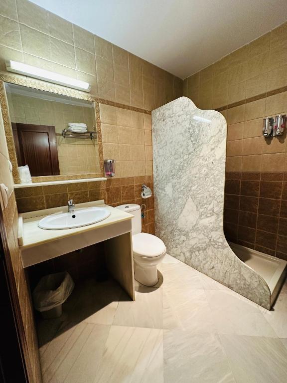 Koupelna v ubytování Hotel Quitagolpe